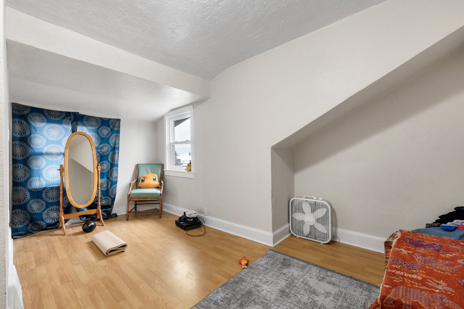 Sitting room featuring wood finished floors and baseboards