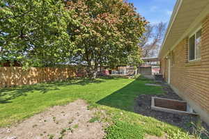 View of fenced backyard