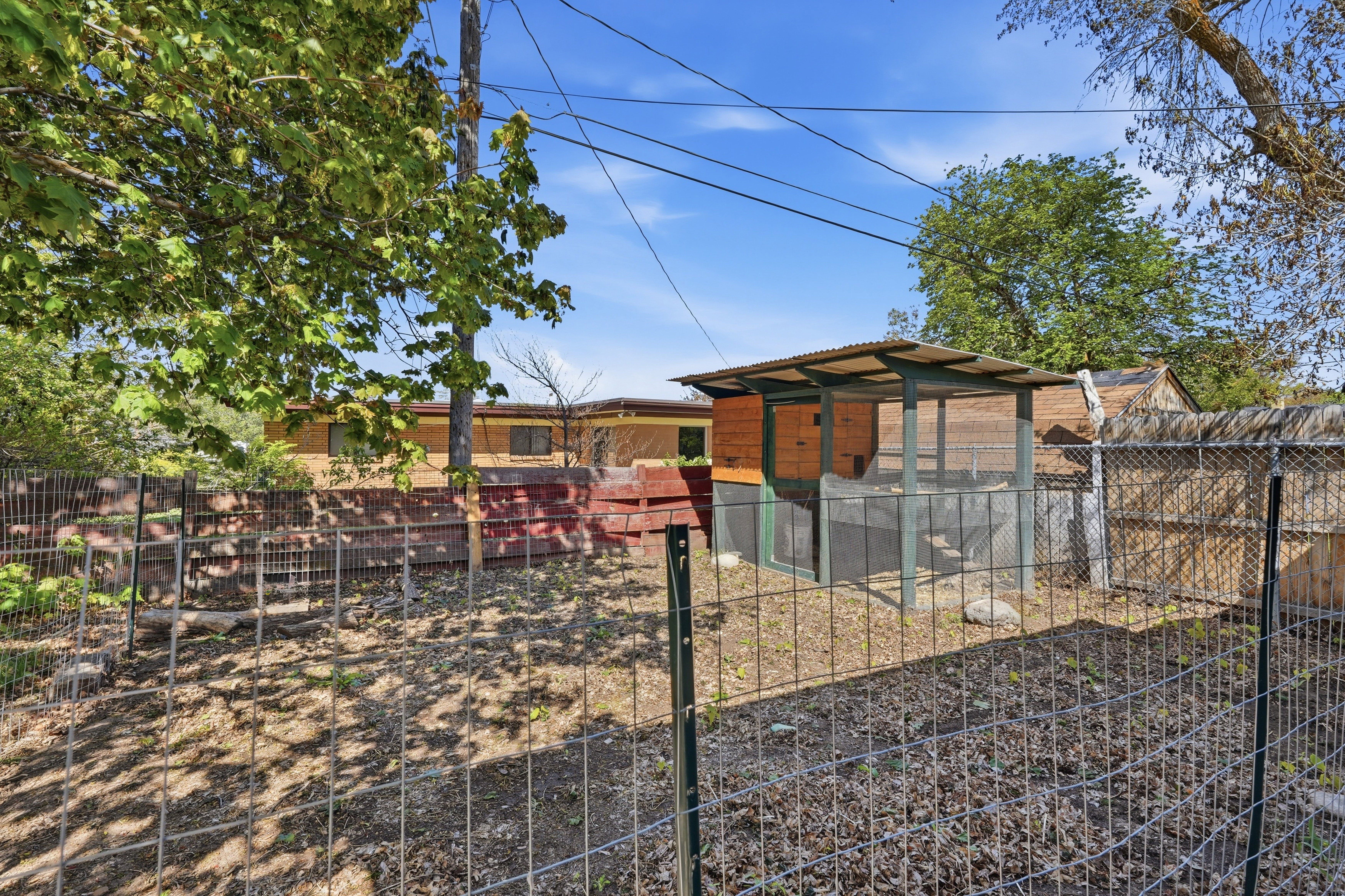View of yard featuring an outdoor structure and exterior structure