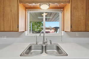 Kitchen featuring light countertops