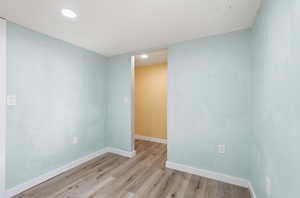 Spare room with recessed lighting and light wood finished floors