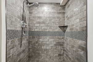 Bathroom view of a tile shower
