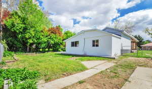View of side of property with concrete block siding