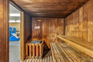 Relaxing sauna with wood ceiling and wood walls