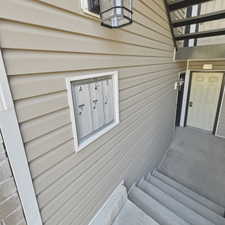 Property entrance showing mailbox