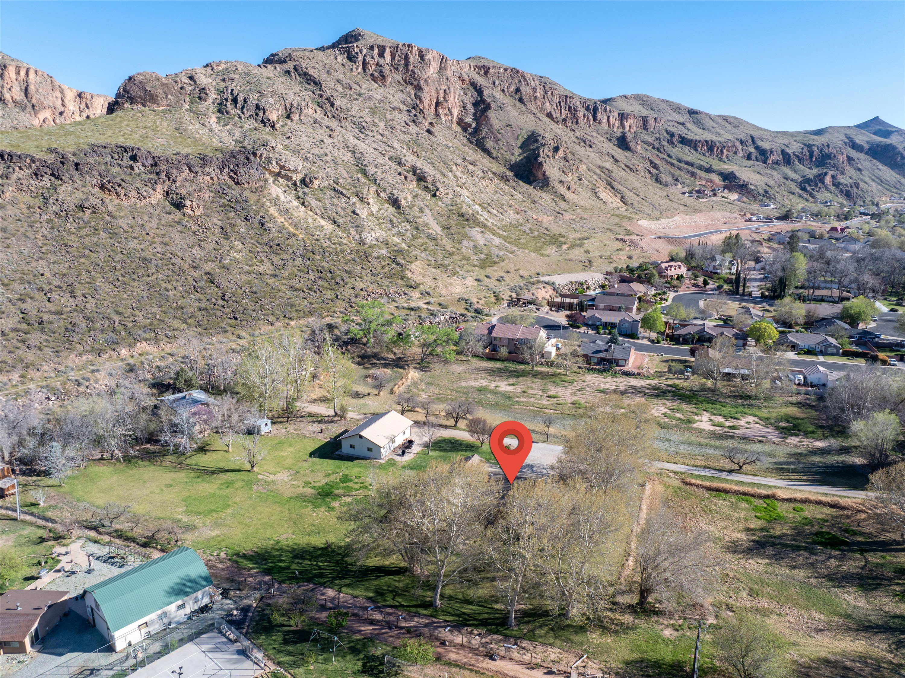 Aerial view of residential area with mountains