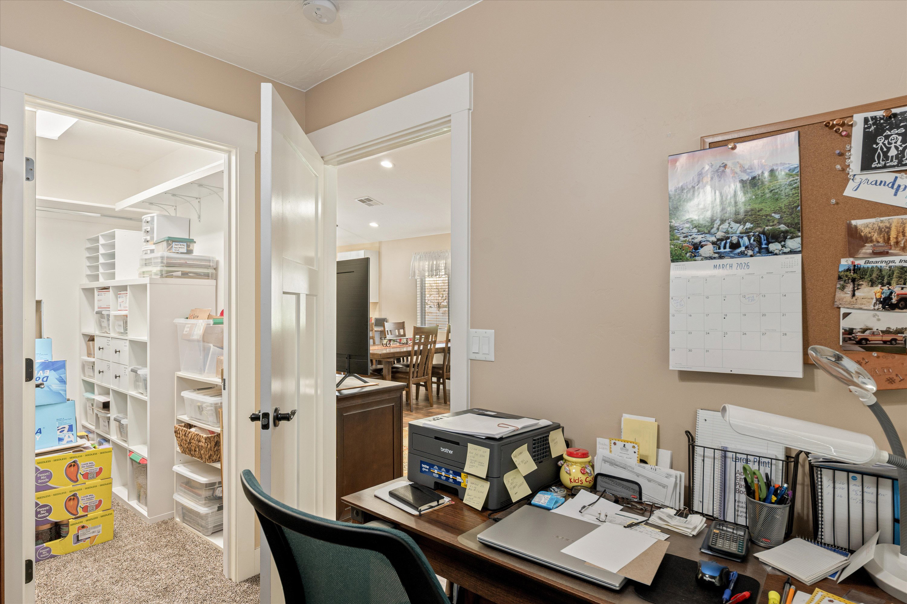 Home office with light colored carpet