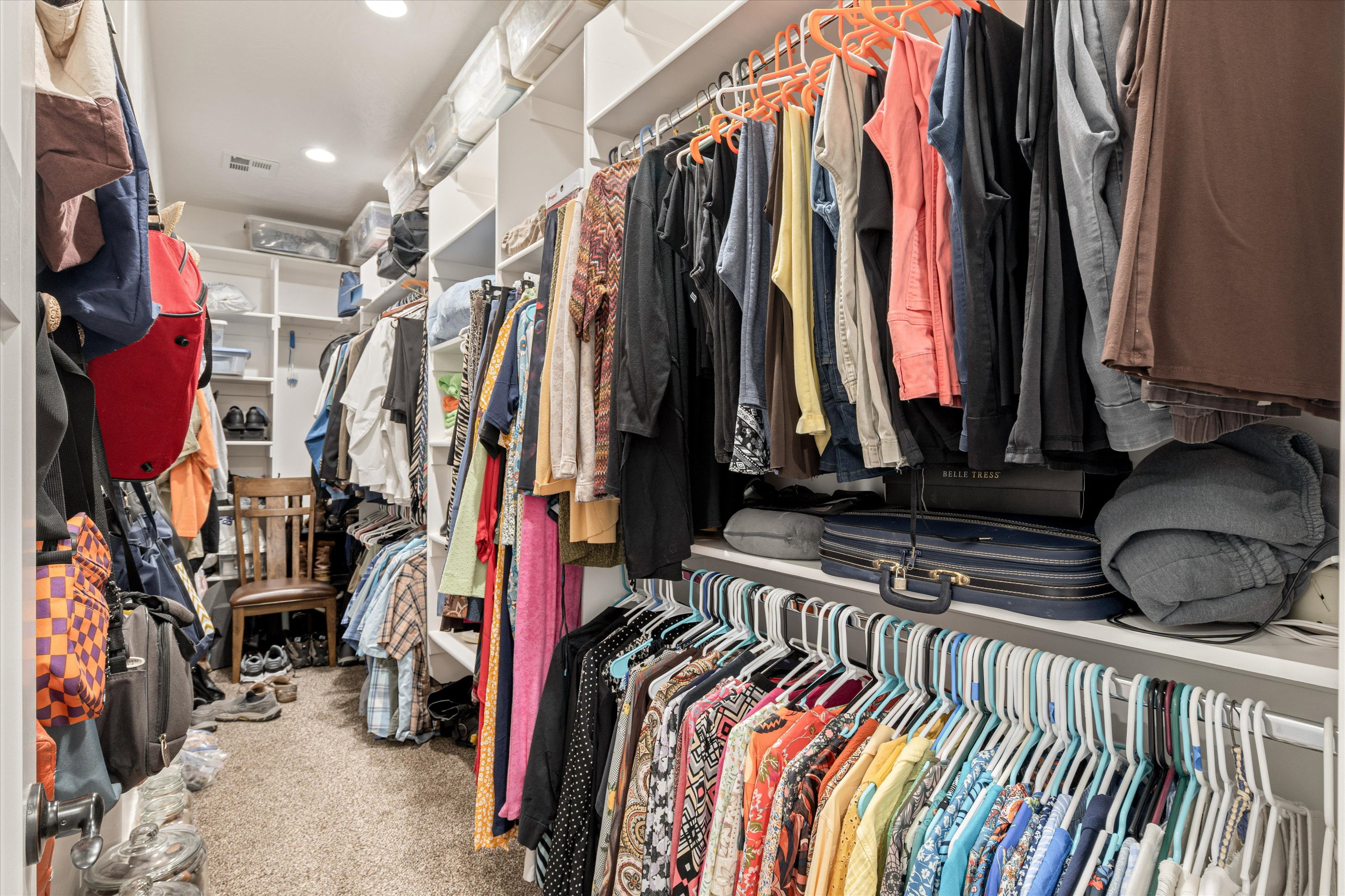 Walk in closet featuring carpet floors