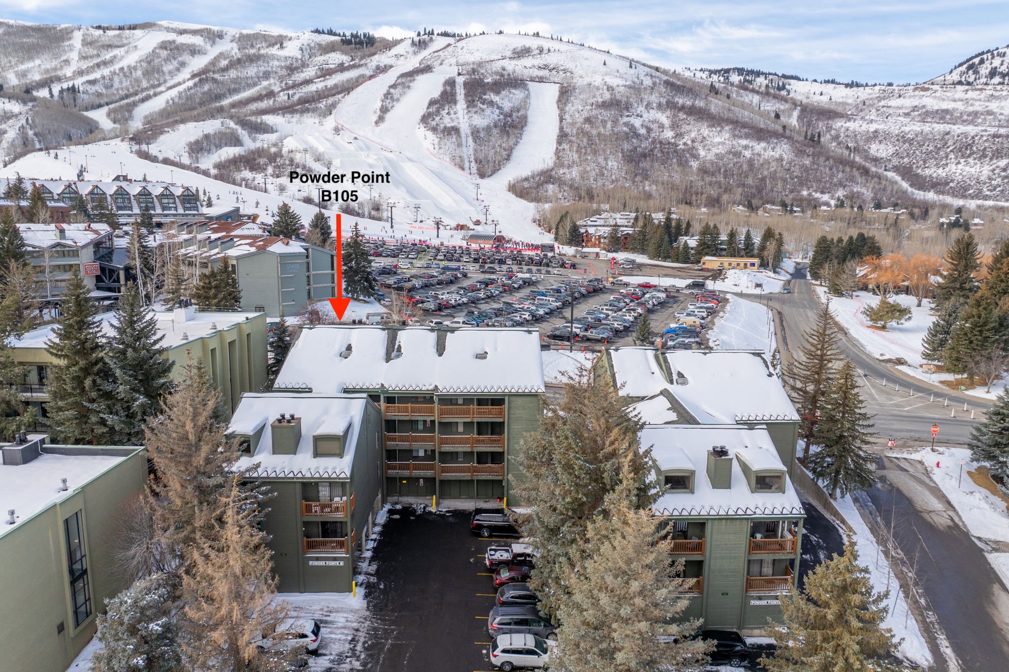Snowy aerial view with a mountain view