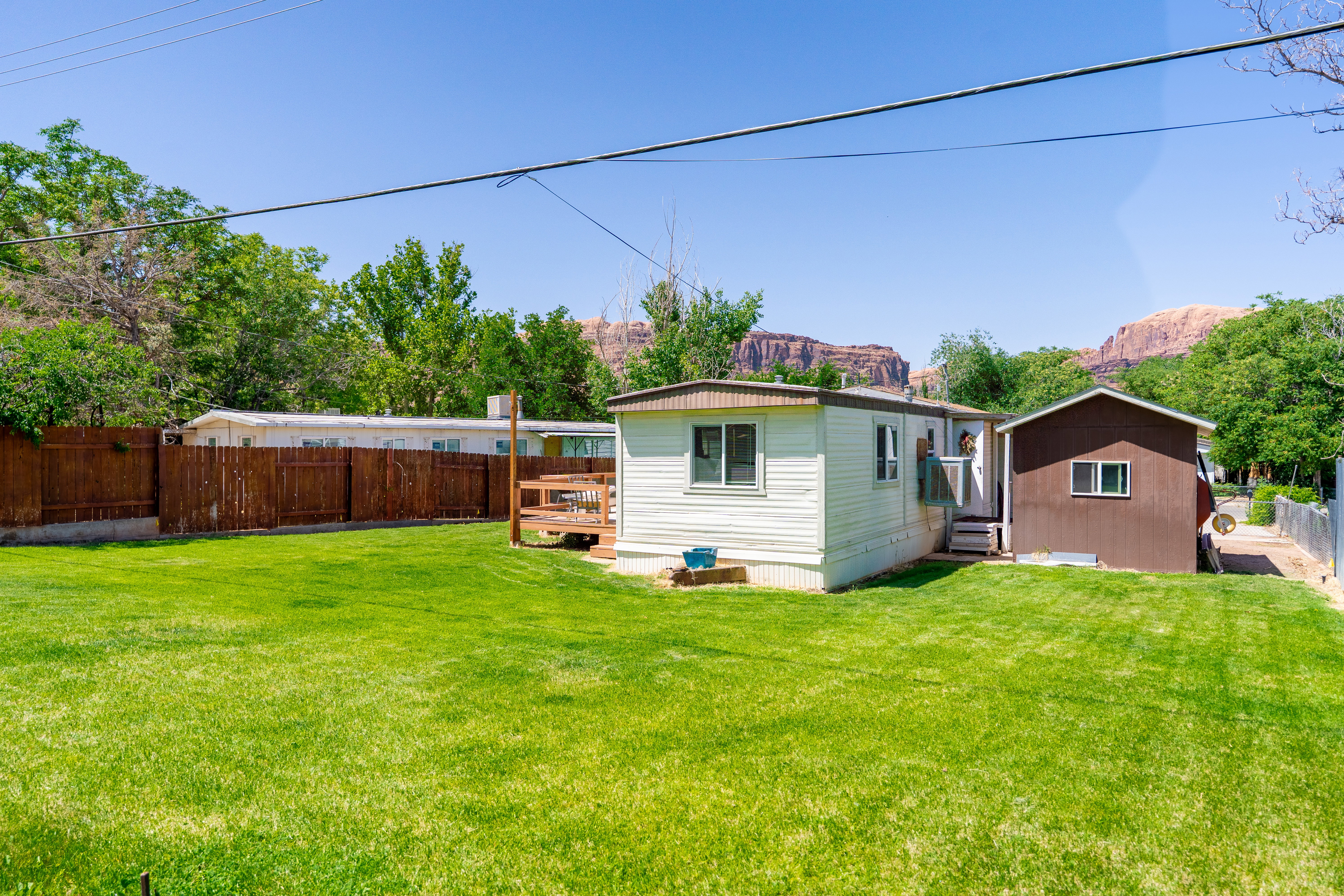 Fenced yard with a mountain view