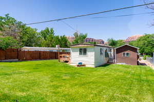 Fenced yard with a mountain view