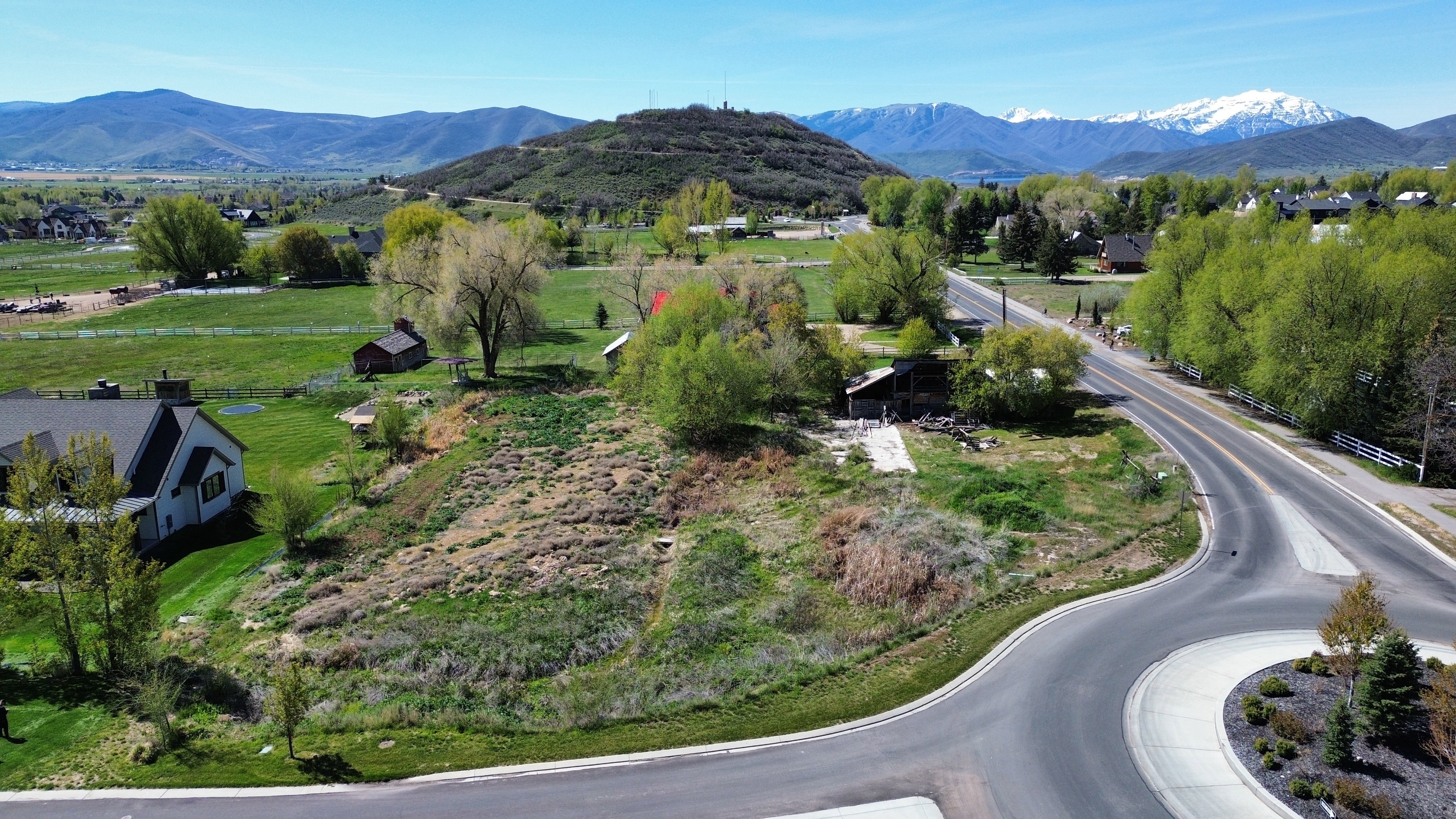 View of mountain background featuring rural landscape