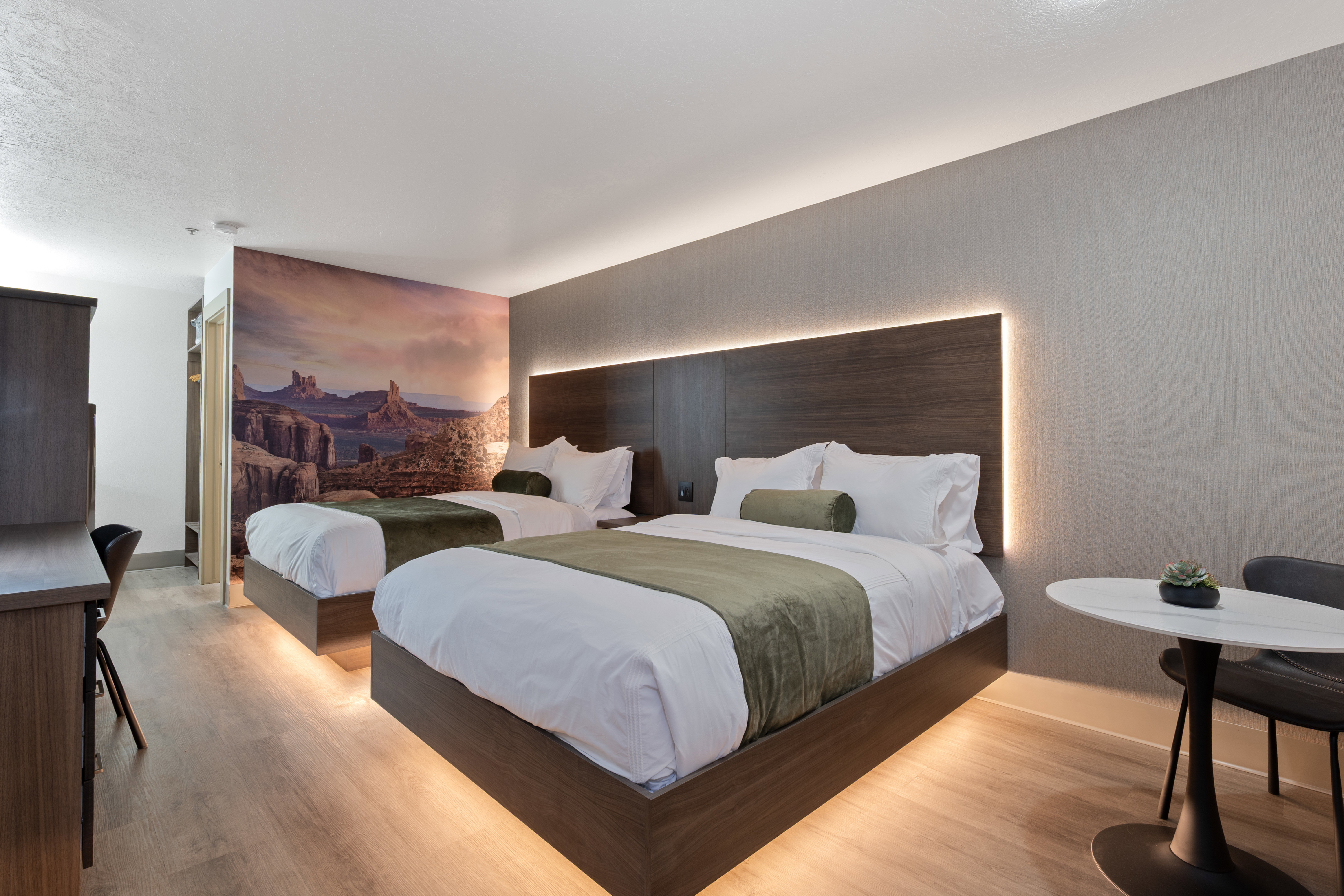 Bedroom with light wood-type flooring and baseboards