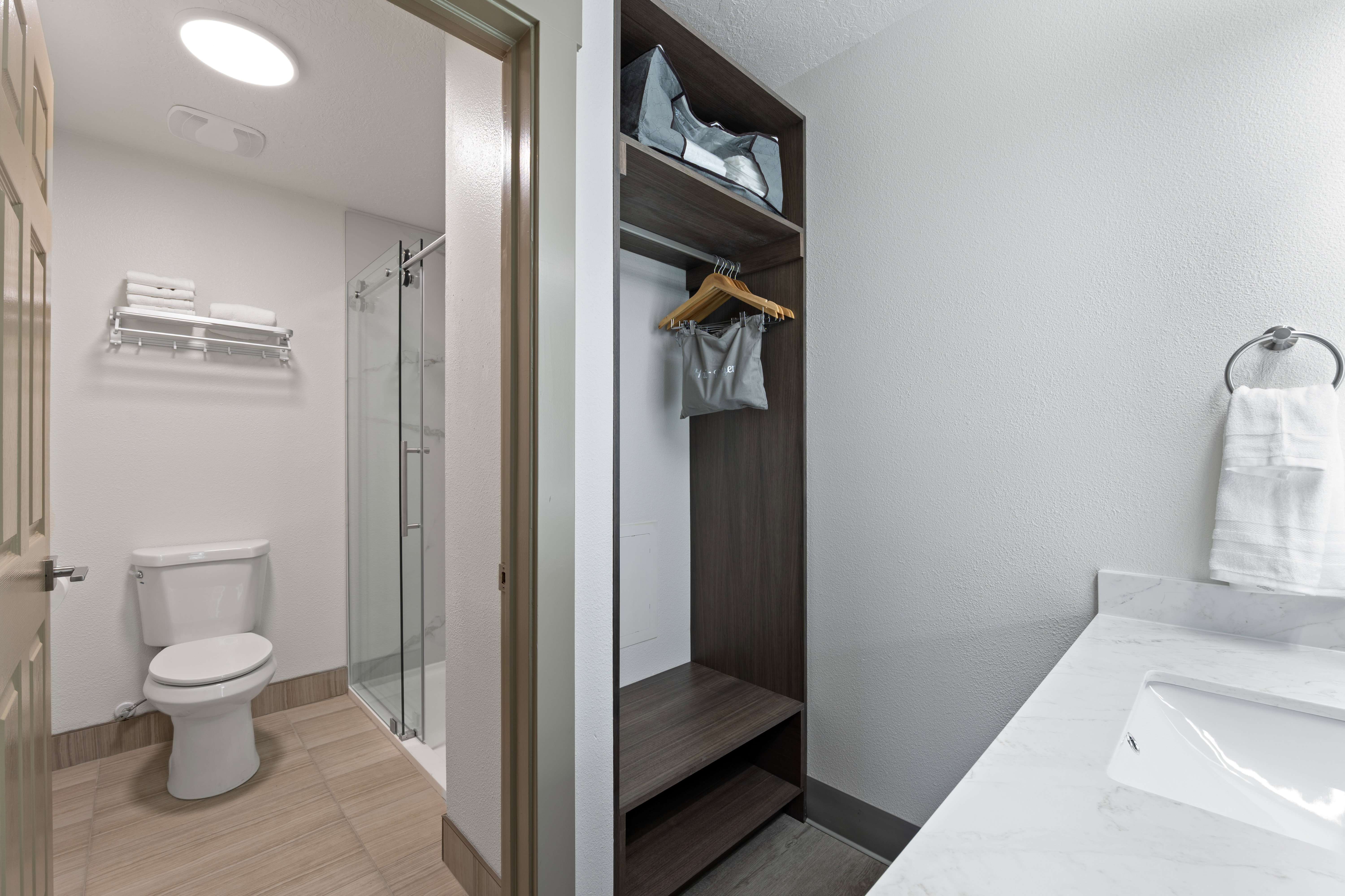 Full bathroom with a stall shower and vanity