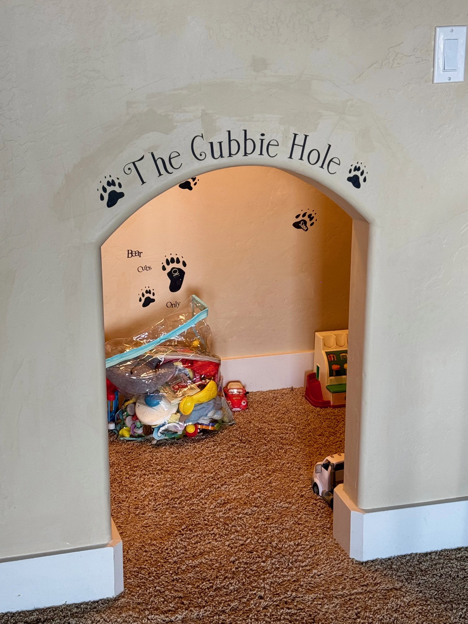 KIds' cubby under stairs