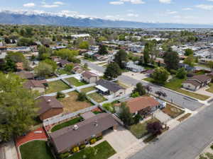 View of property location with a mountain backdrop and nearby suburban area