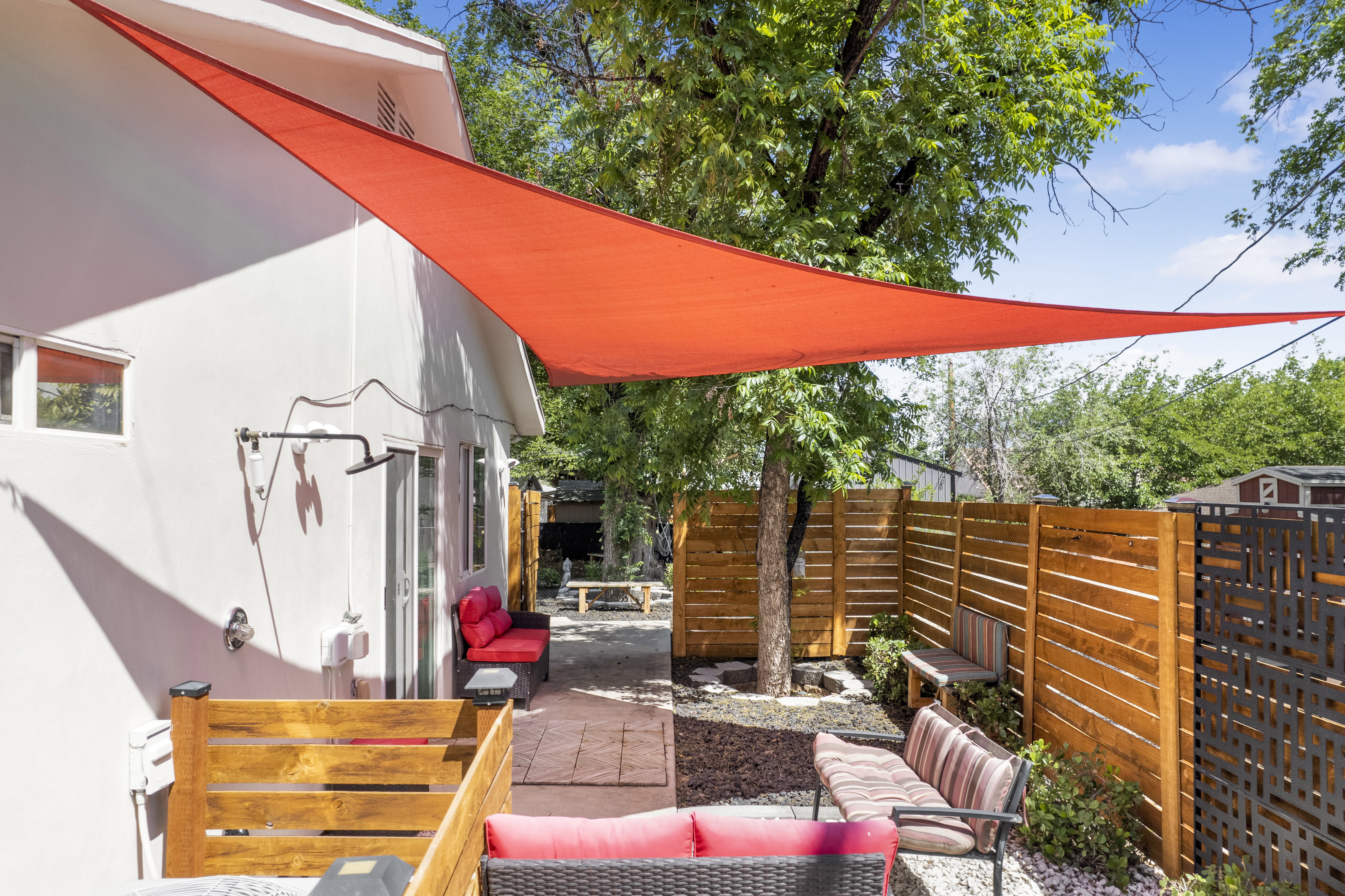 Fenced backyard featuring a patio and outdoor furniture