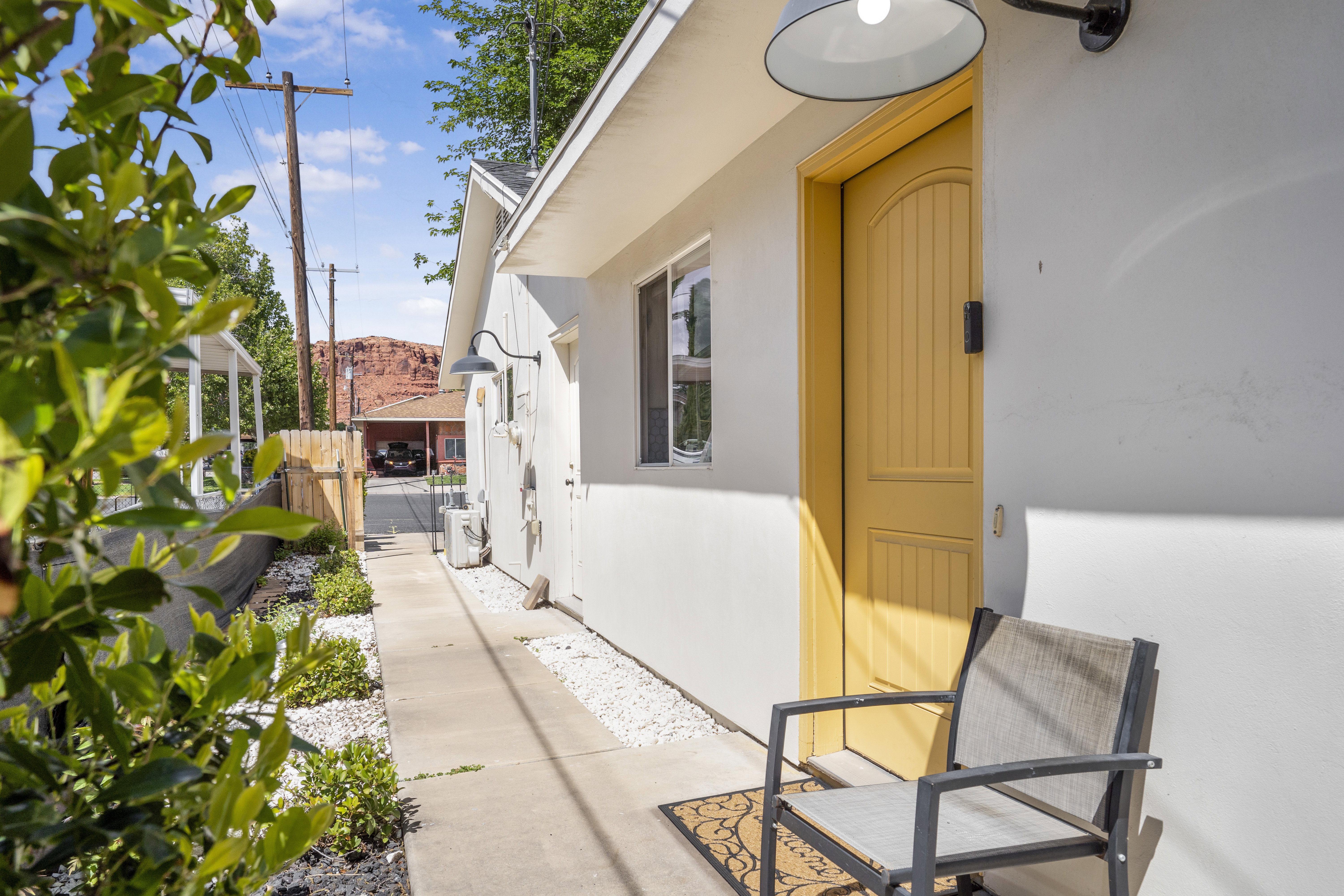 Entrance to property featuring stucco siding