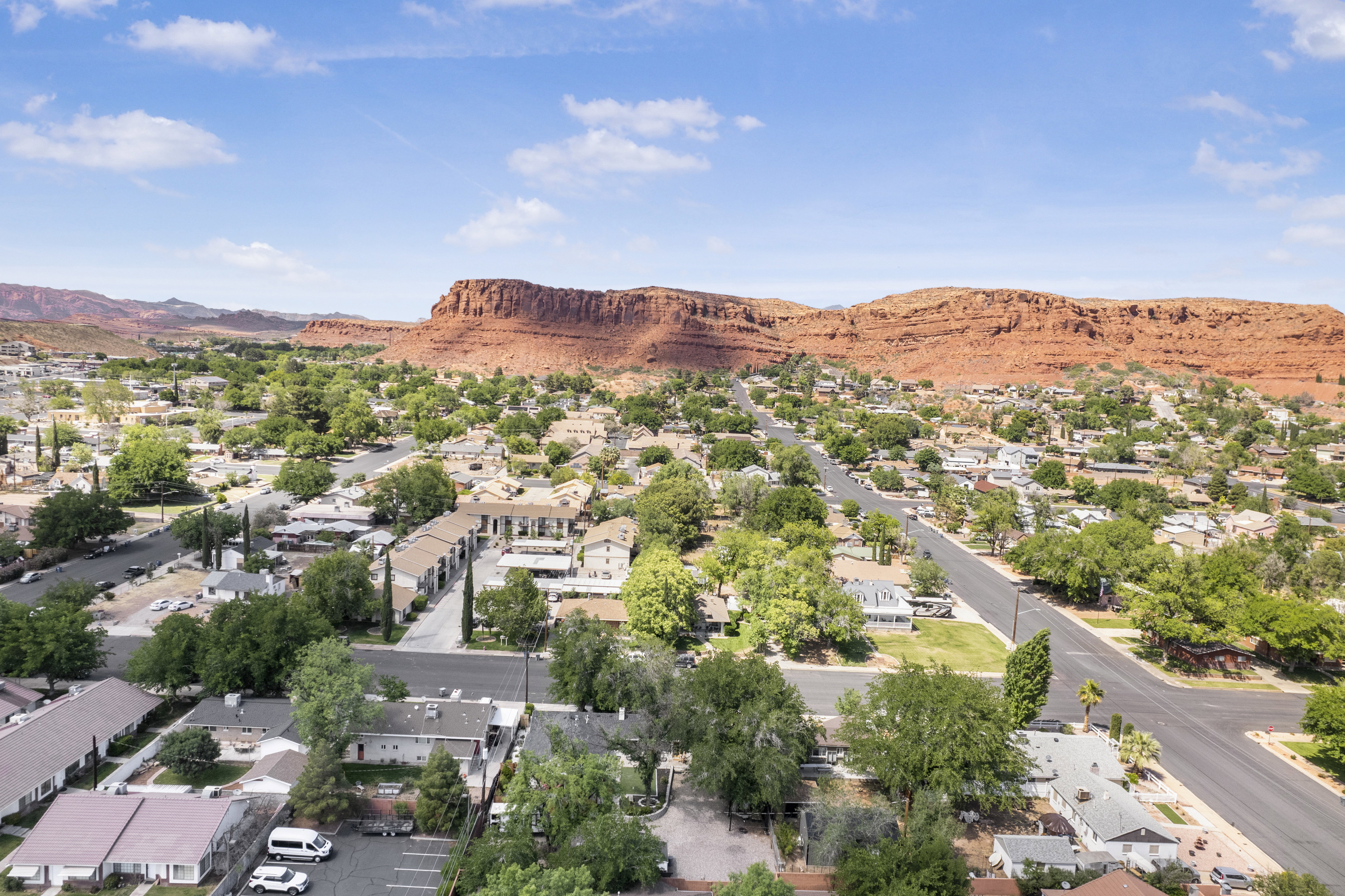 Aerial perspective of suburban area featuring mountains