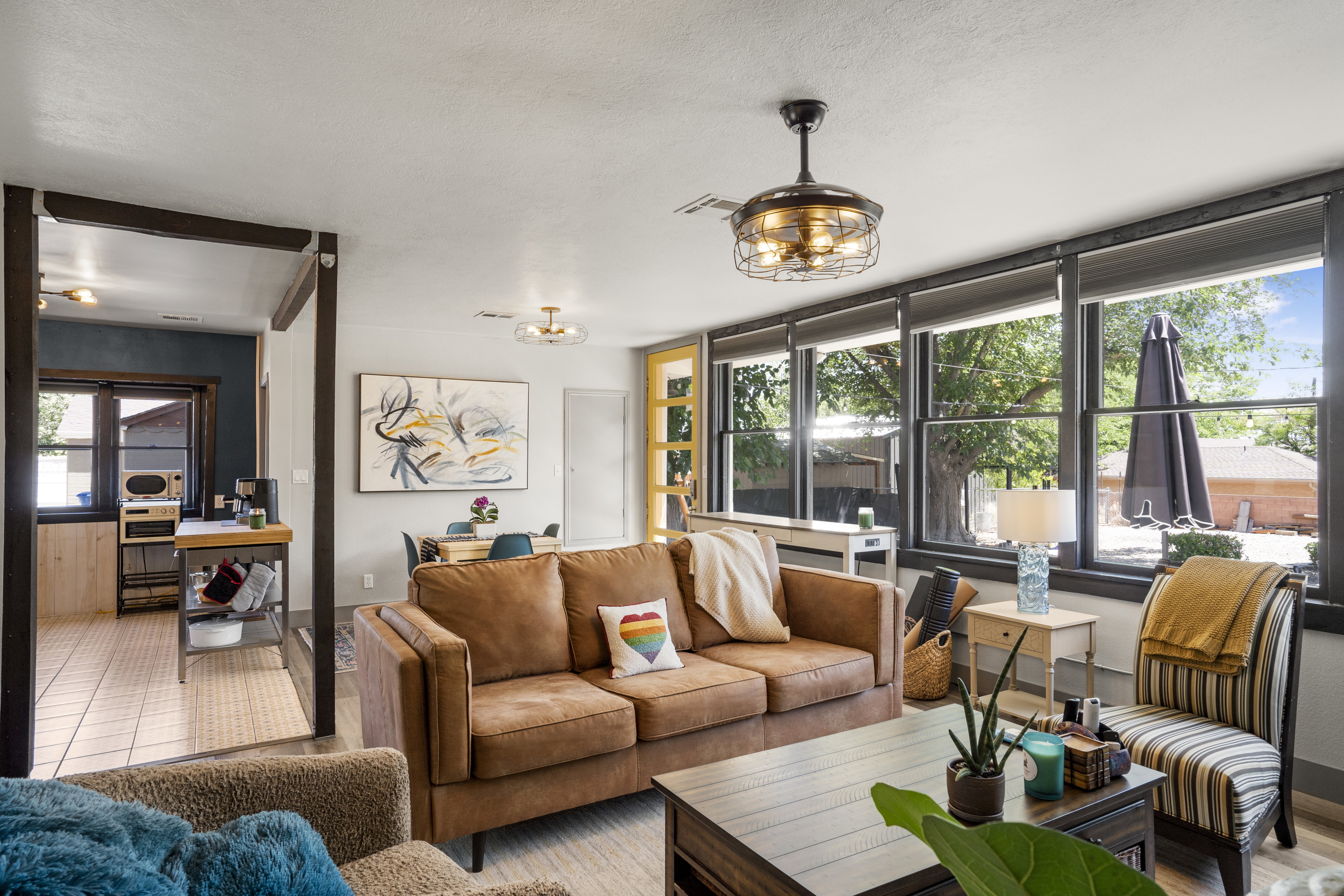 Living room featuring baseboards and tile patterned floors
