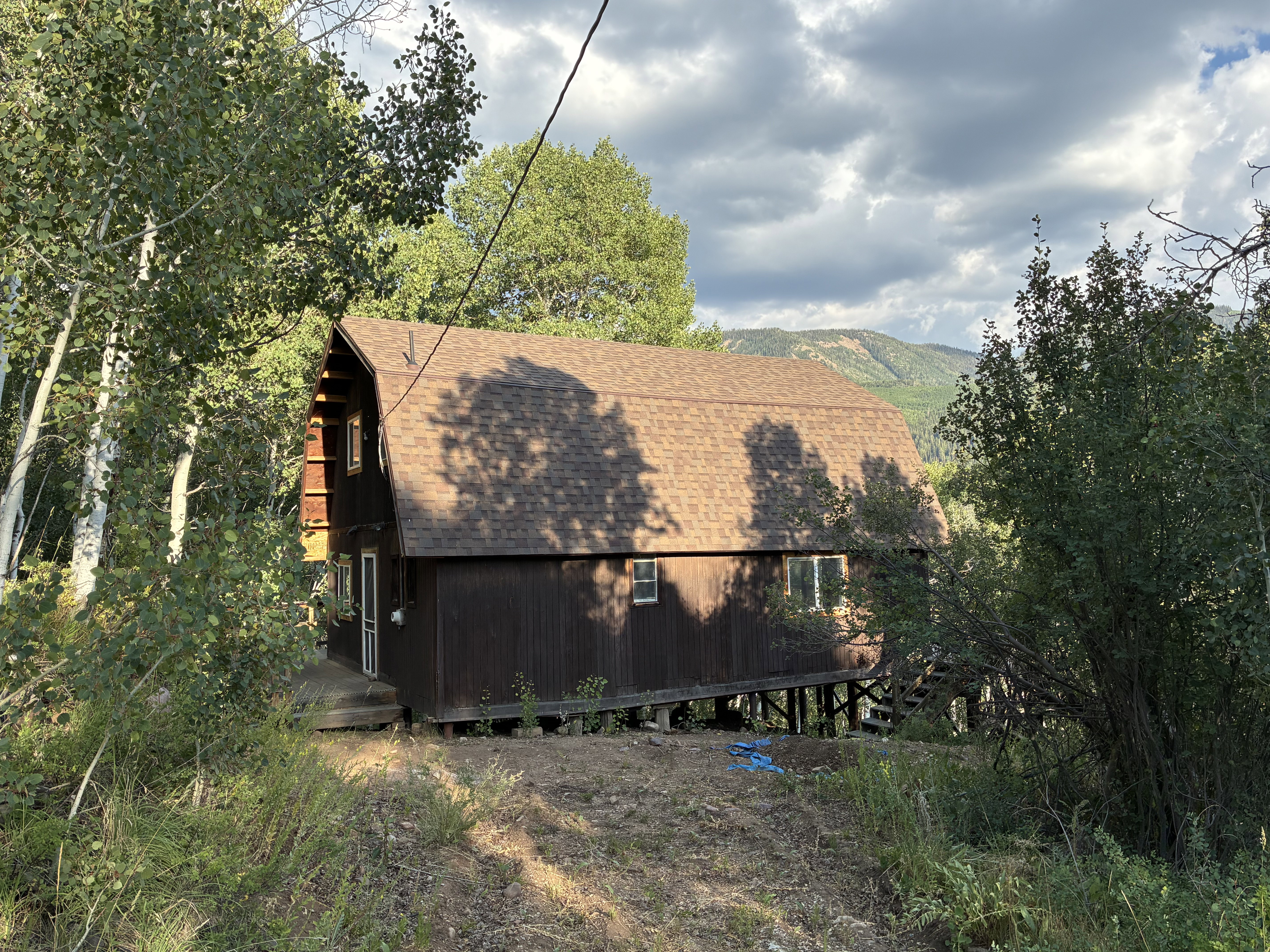SIde of cabin. This is where you can have more parking.