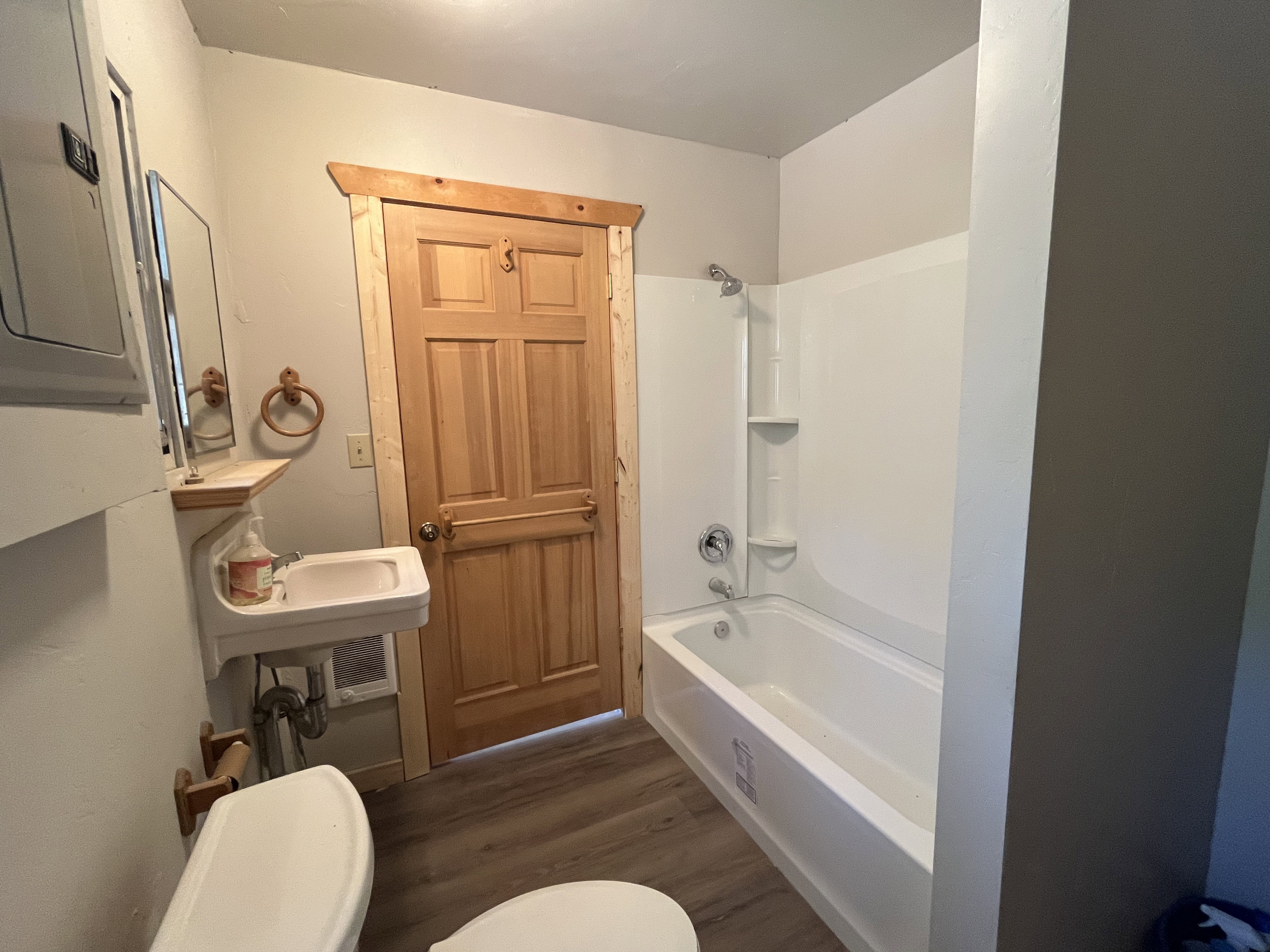 Bathroom with washer and dryer hookups.