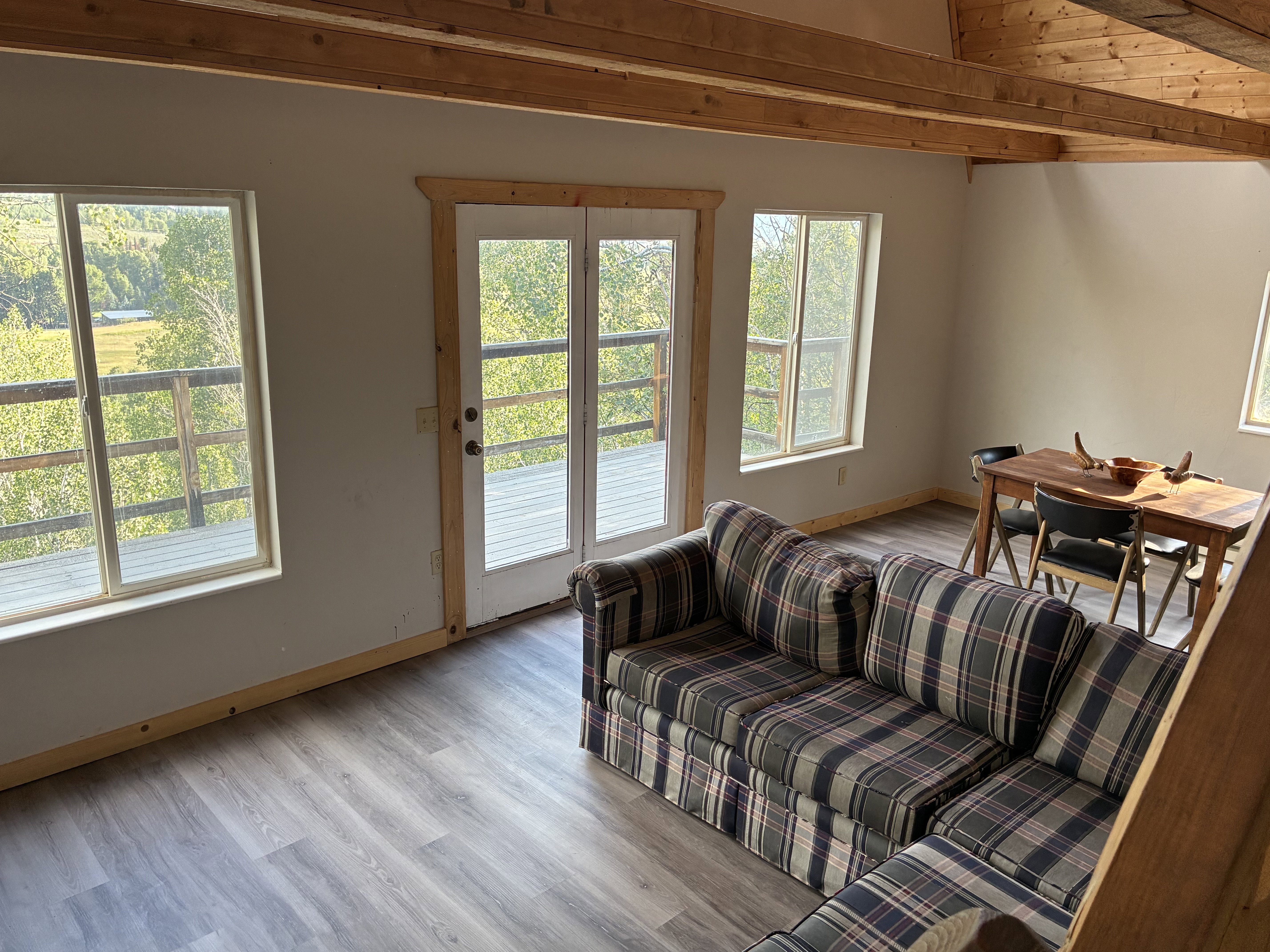 Great room with a wall of windows and amazing views.
