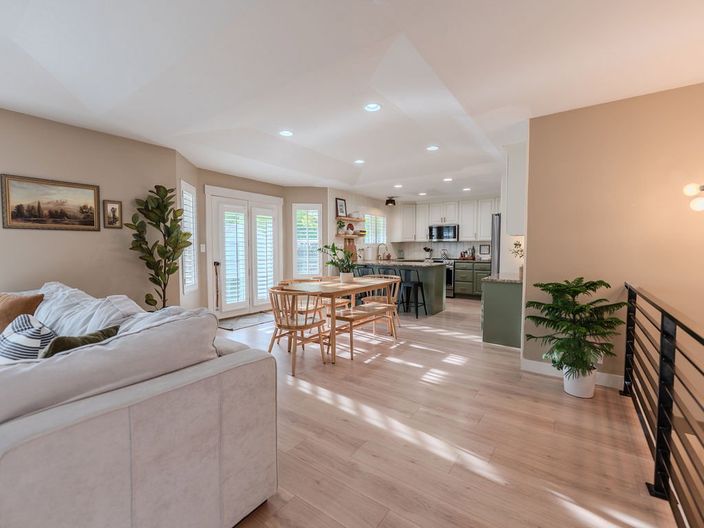 Living room featuring recessed lighting and light wood-style flooring