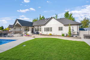 Entertainers dream back yard with covered patio, salt water pool and timber pergola
