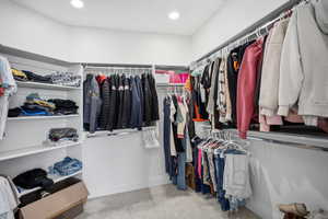 Spacious walk-in closet in primary suite