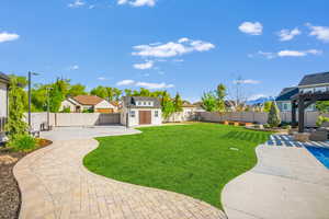 Entertainers dream back yard with covered patio, salt water pool and timber pergola