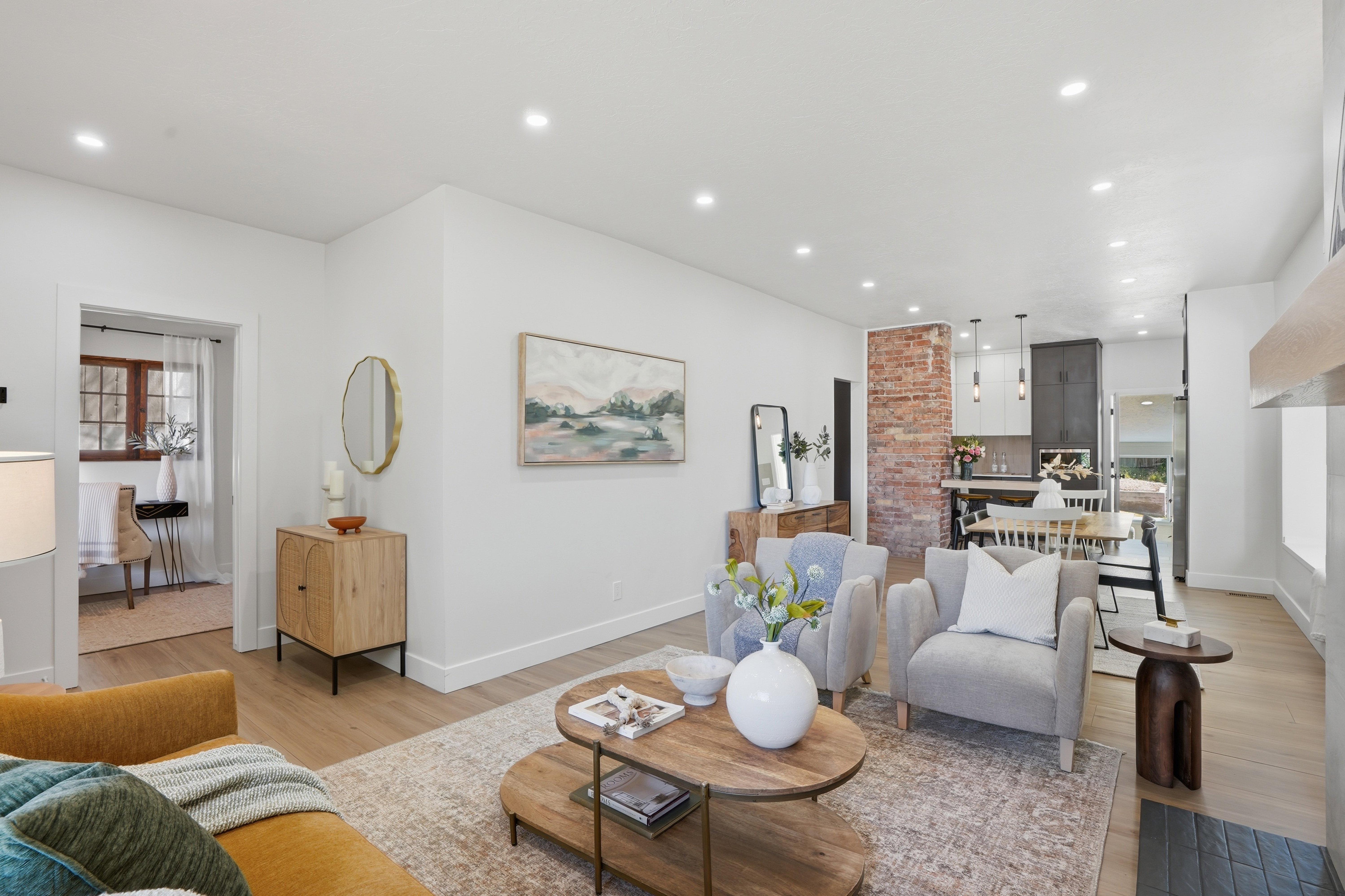 Living area, porcelain glazed tile flooring, and recessed lighting