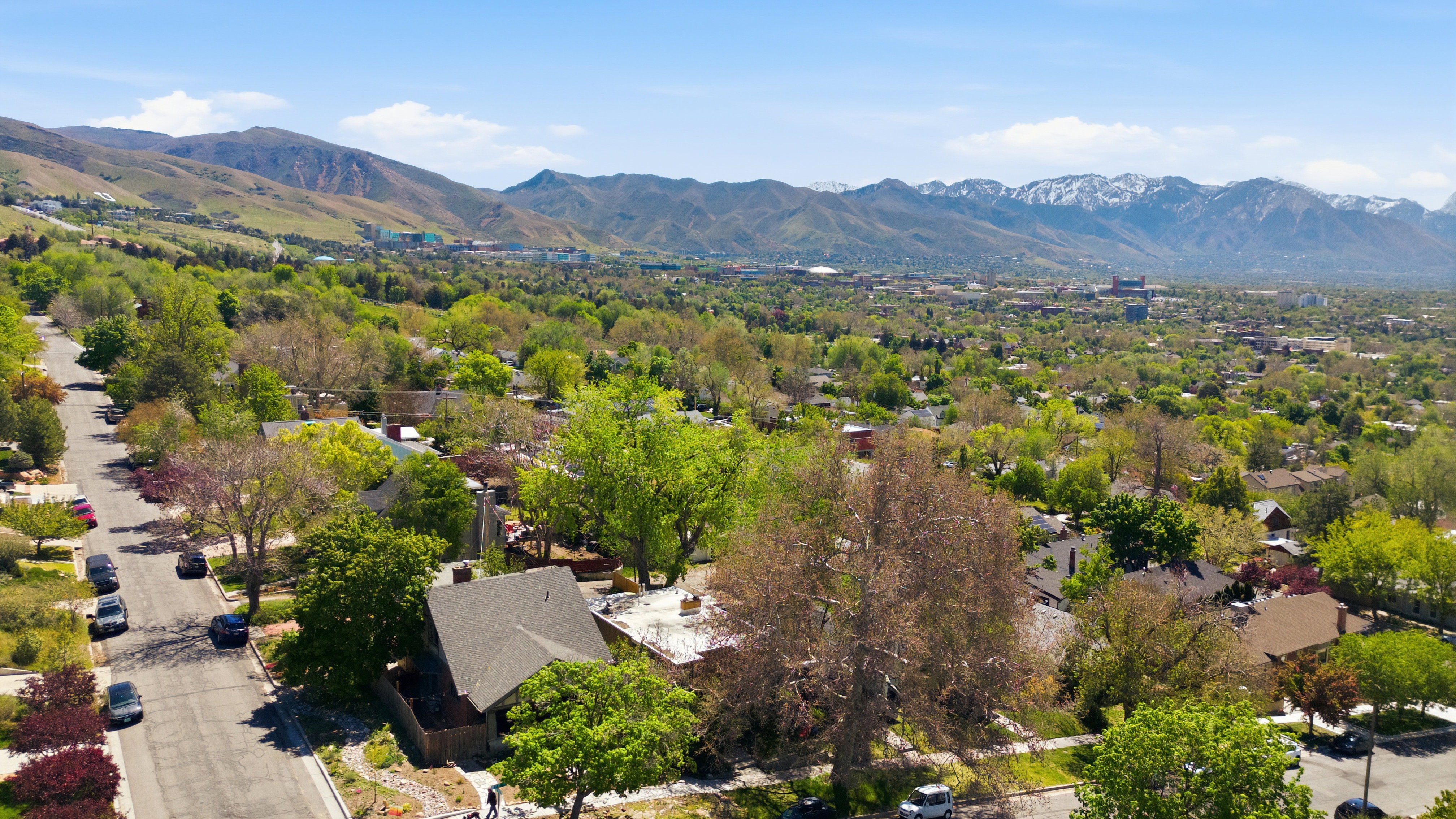 Aerial perspective of suburban area with mountains