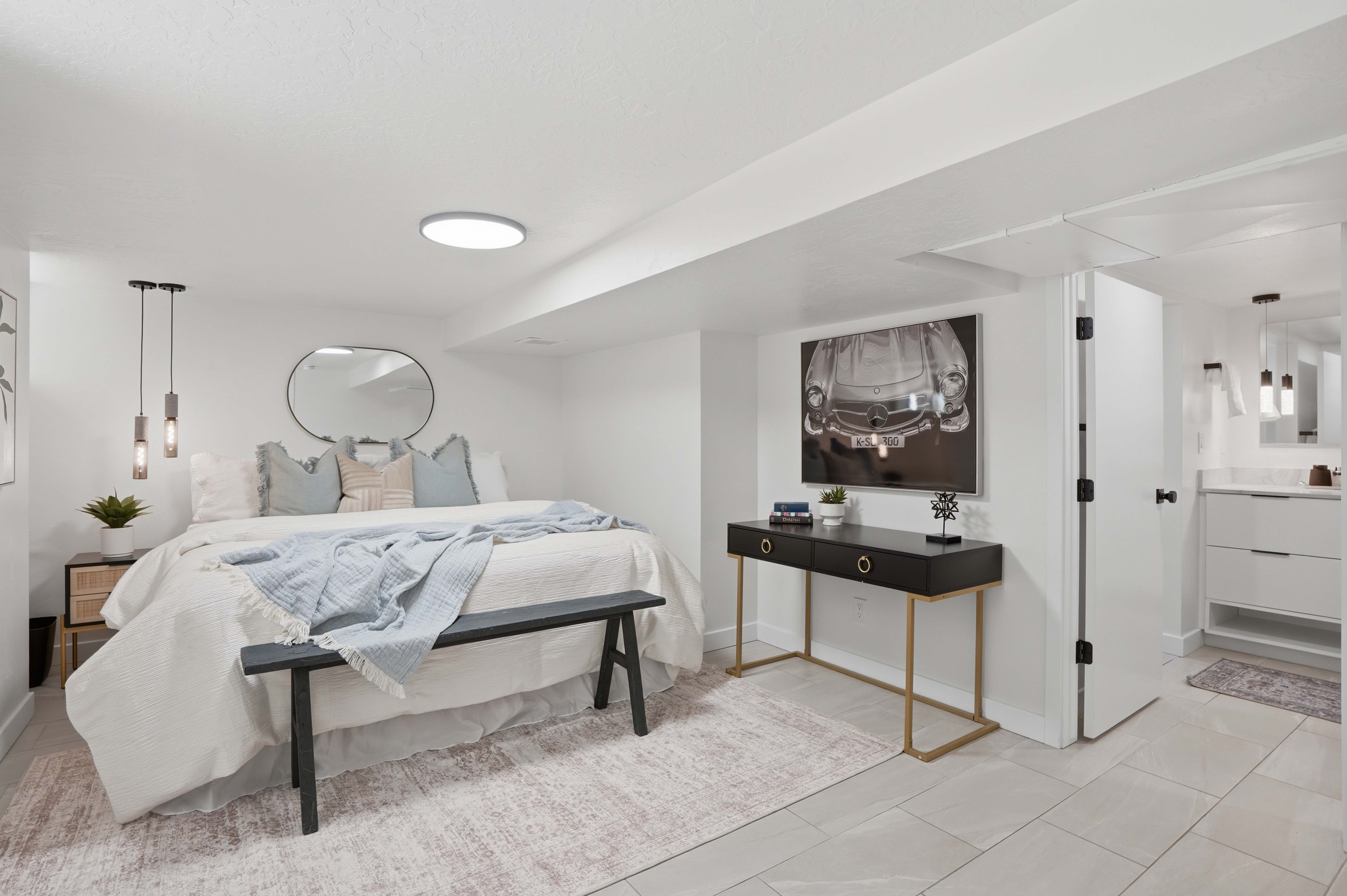 Bedroom featuring ensuite bathroom