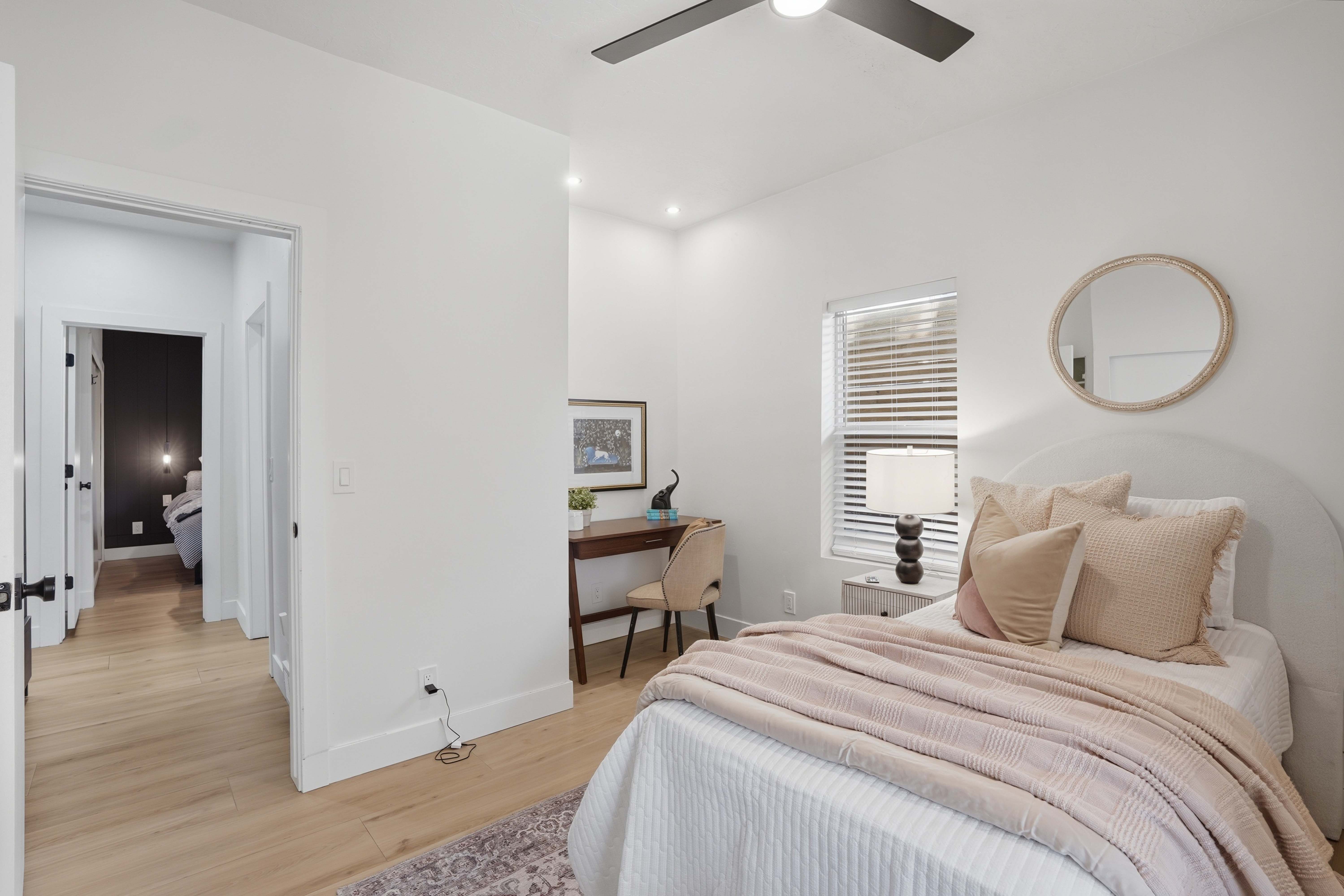 Bedroom with a ceiling fan, recessed lighting, and an office area
