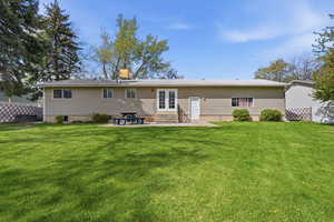 Back of property featuring a patio area, french doors, and entry steps