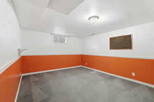View of carpeted spare room