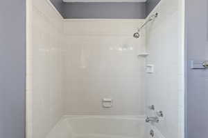 Bathroom with bathing tub / shower combination