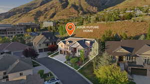 Stone and siding exterior residence with an attached garage, a paved driveway, and established landscaping