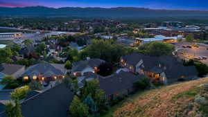 Elevated property offering a residential setting with distant city and mountain backdrops