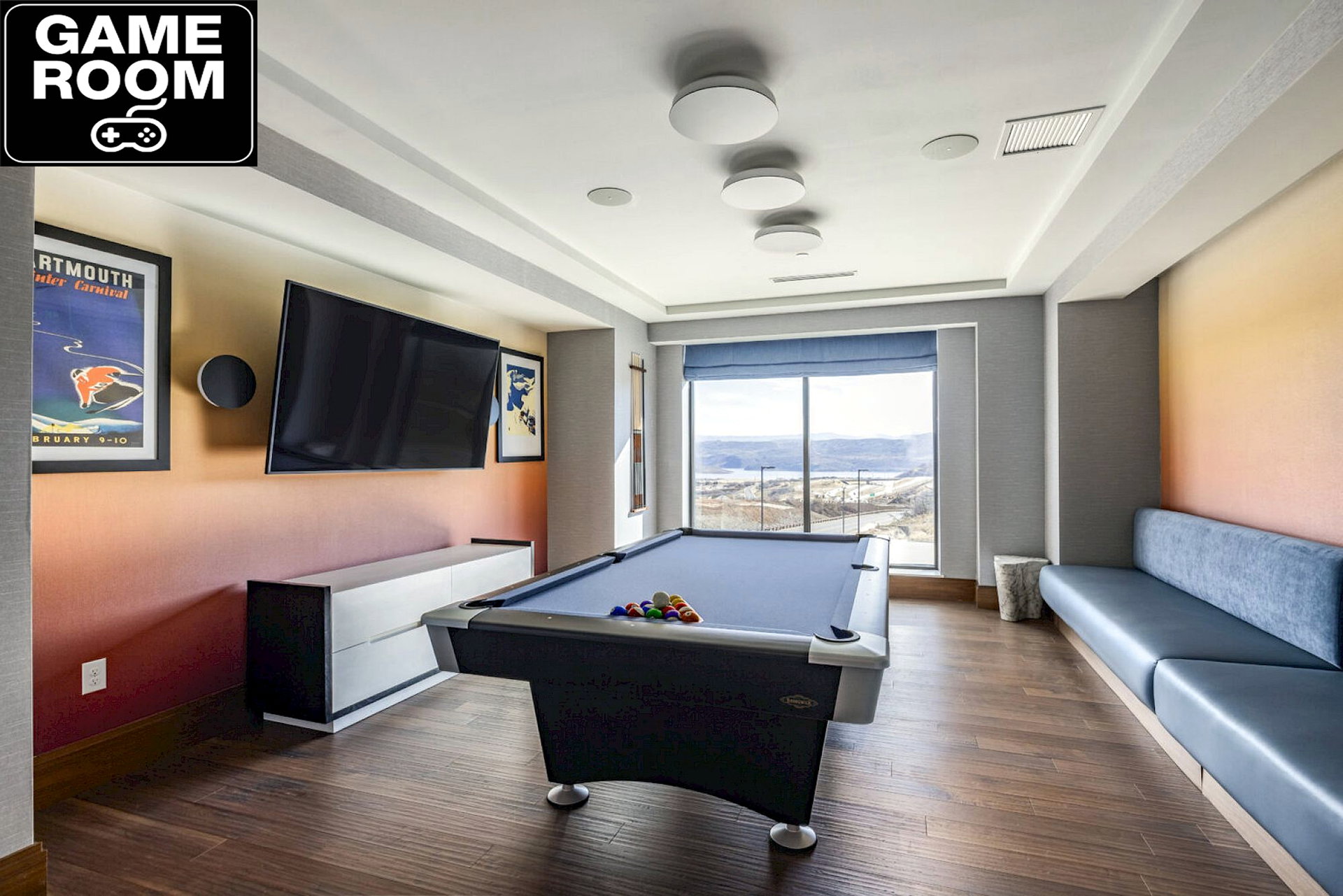 Recreation room with pool table and dark wood-style floors