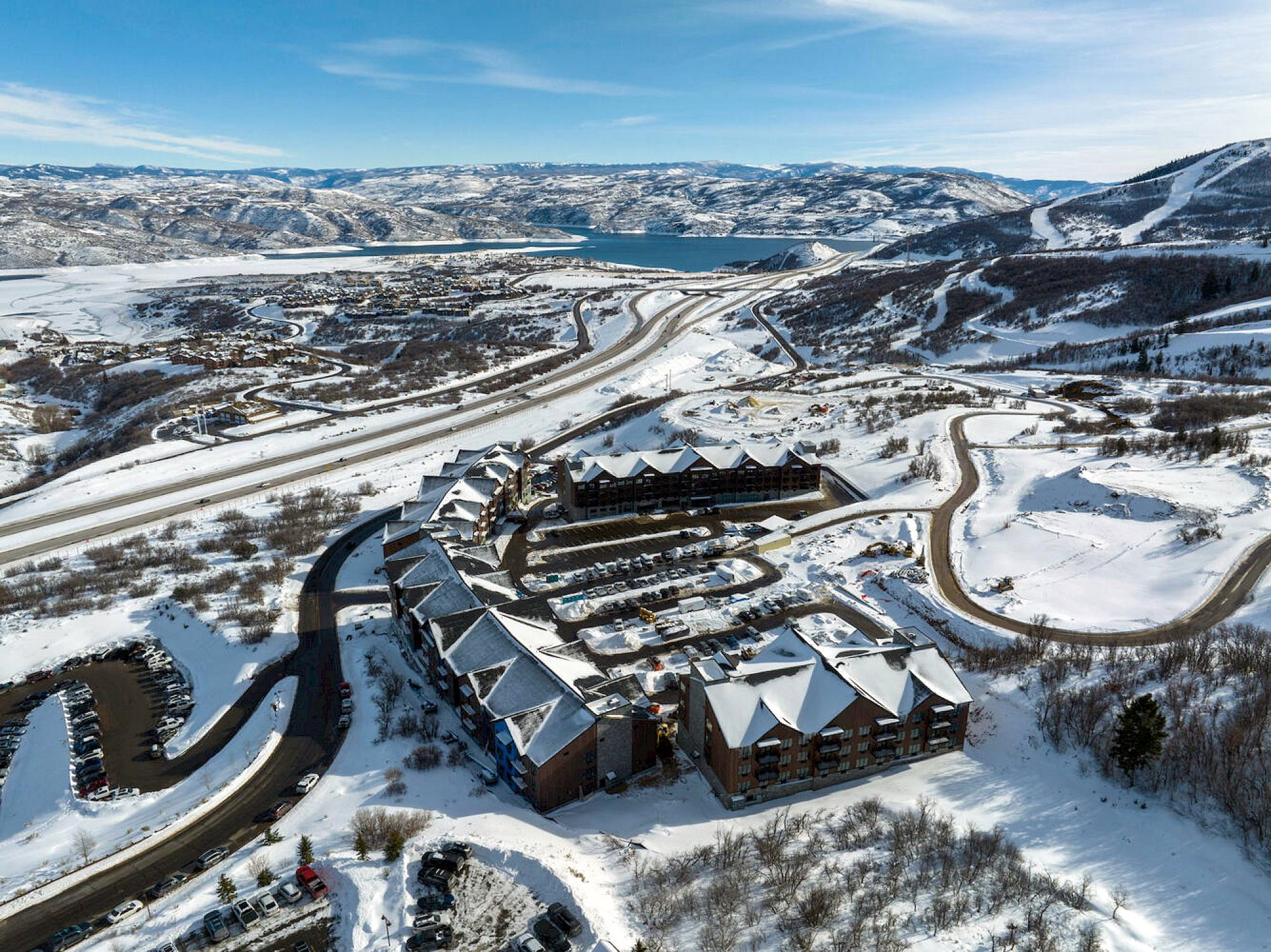 Snowy aerial view with a mountain view