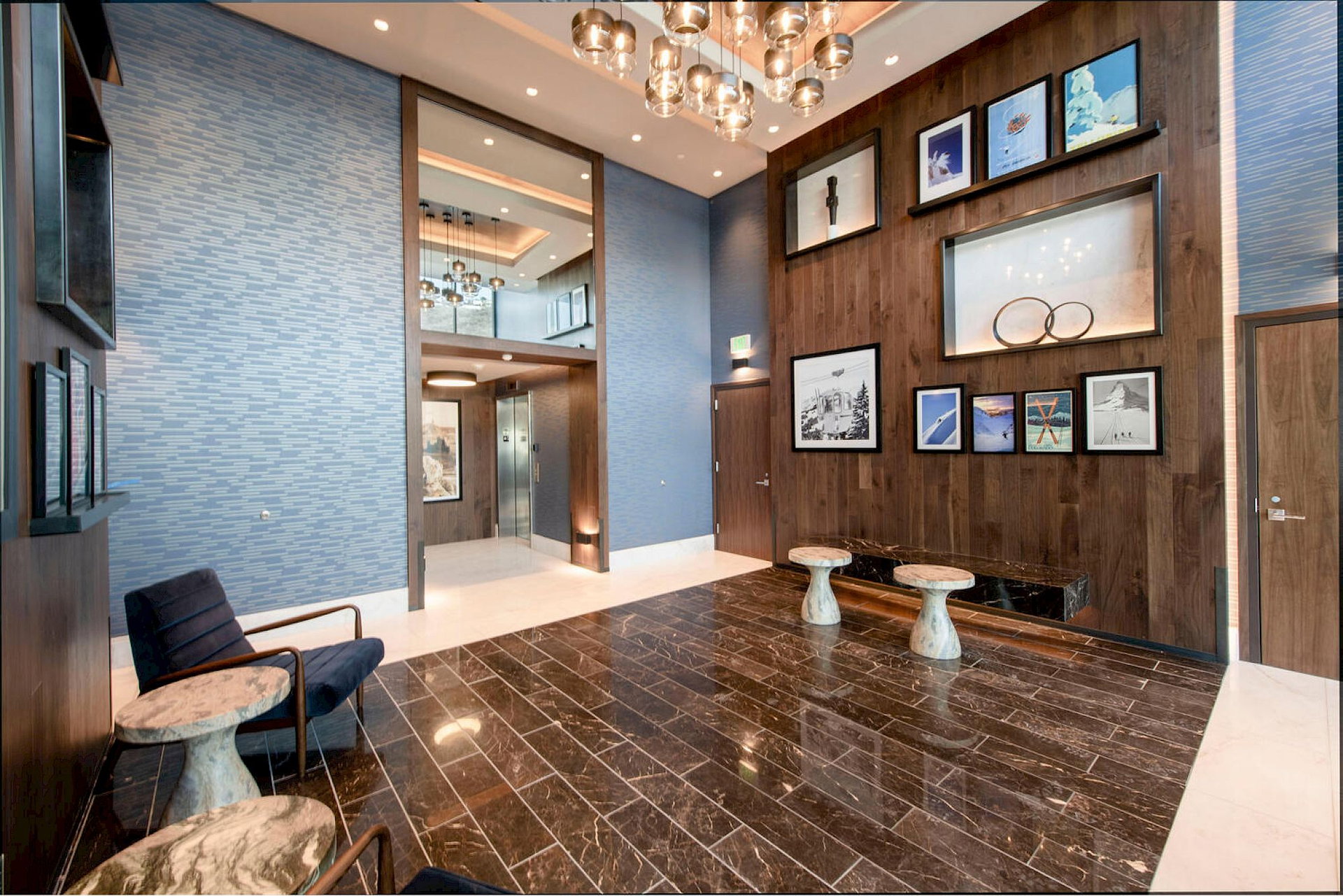 Building lobby featuring a high ceiling and recessed lighting