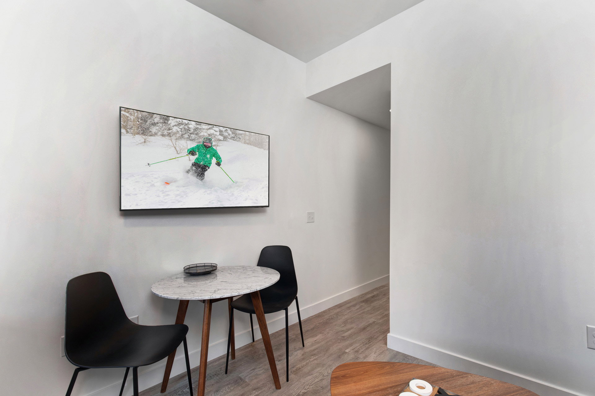 Dining space featuring light wood finished floors and baseboards