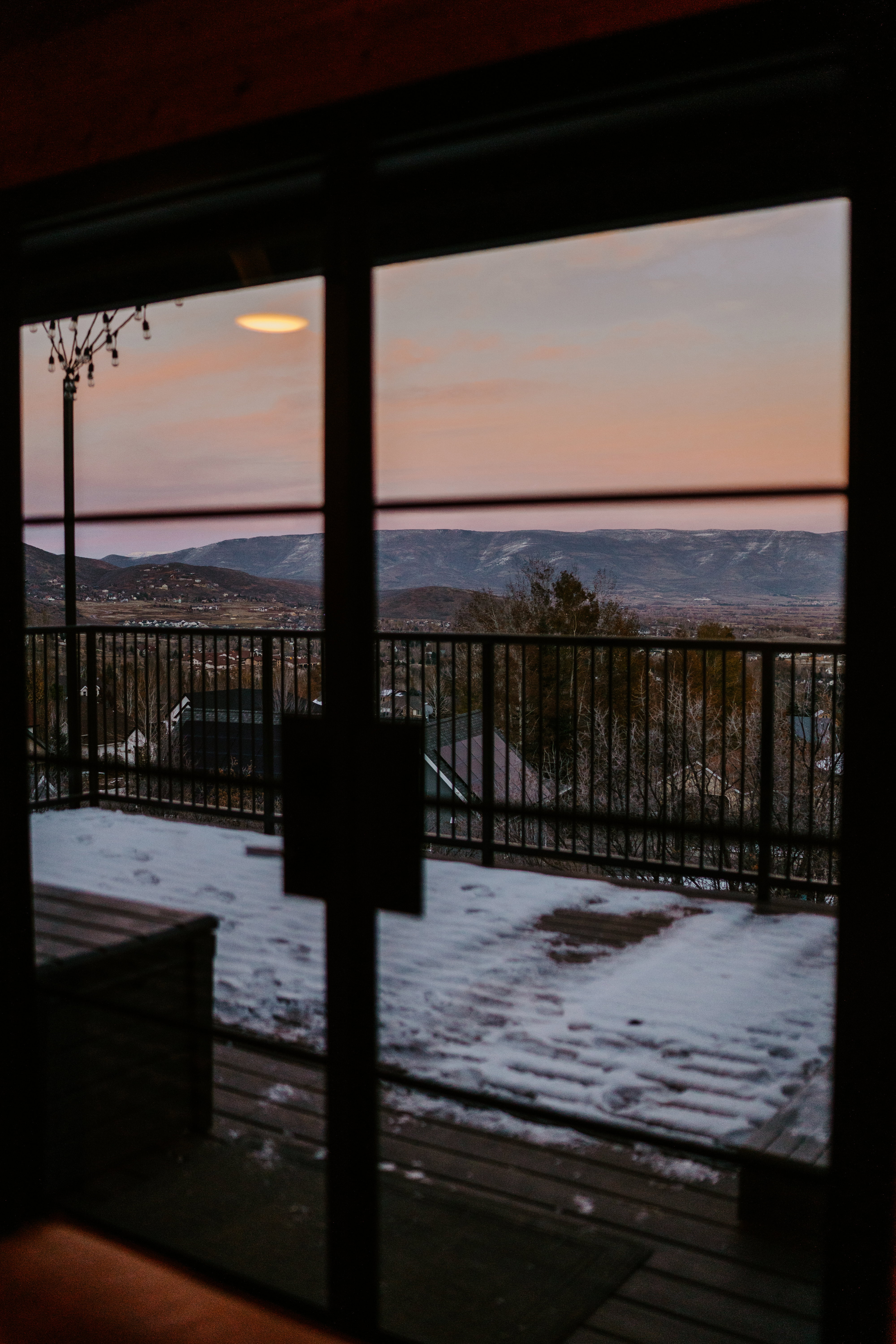 Doorway featuring a mountain view and healthy amount of natural light