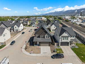 Aerial view of residential area with a mountainous background