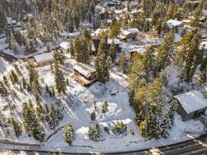 Snowy aerial view with a residential view