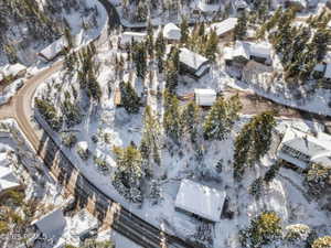 Snowy aerial view with a residential view
