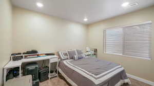 Bedroom with carpet and recessed lighting