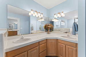 Full bathroom featuring double vanity